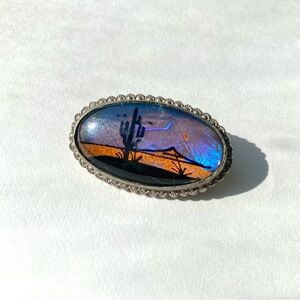 Vintage butterfly wing bubble glass pewter brooch with Southwest Cactus Design